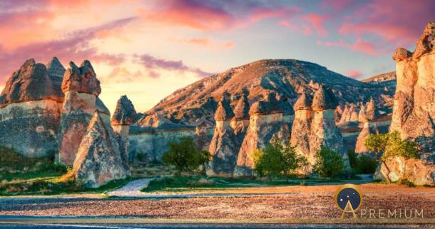 Enchanted landscape of Fairy Chimneys forms of sandstone in the canyon near Cavusin village, Cappadocia (Andrew Mayovskyy / Adobe Stock)