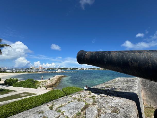 A cannon in Fort Montagu protects the entrance to Nassau's pirate harbor at New Providence Island in the Bahamas