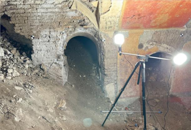 Arched doorways and colorful frescoes inside the Domus Liceo Cavour beneath the school gym