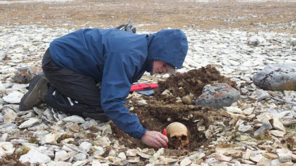 Anthropologist Douglas Stenton excavates the remains of a Franklin expedition sailor at Erebus Bay.