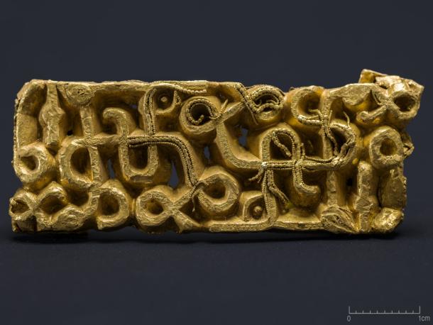 The richly decorated 1,500-year-old gold sword scabbard fitting.