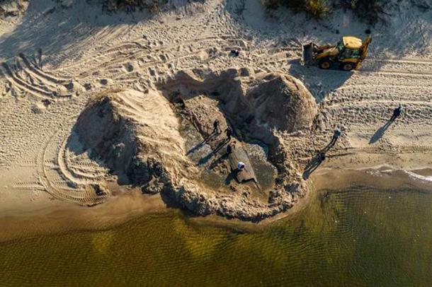 An aerial view of the Latvian shipwreck as it was found in deep beach sand near the country’s capital, Riga. Source: Rigas Brivosta