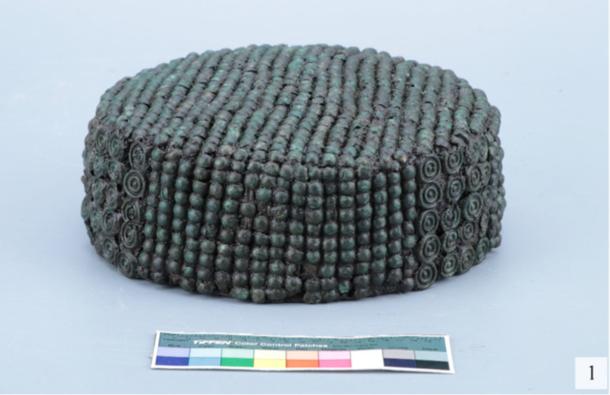 A rare 2,500-year-old woman&rsquo;s leather cap decorated with small bronze plaques, discovered in a Scythian-era burial in Ukraine.