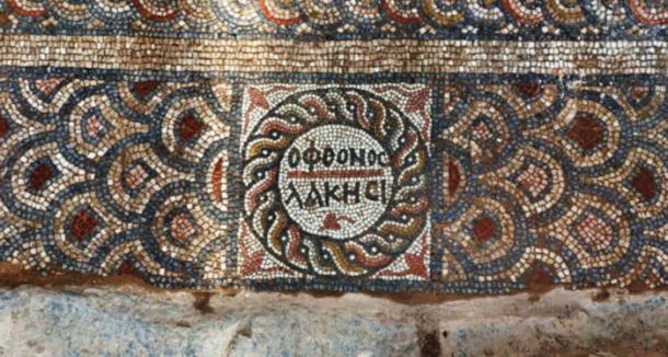 The mosaic motif at the southern entrance of the building in Syedra, with the Envy message.