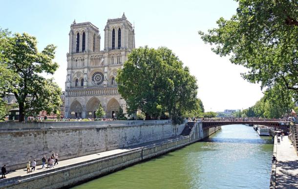 Landscape view of Notre Dame Cathedral in Paris from the River Seine.