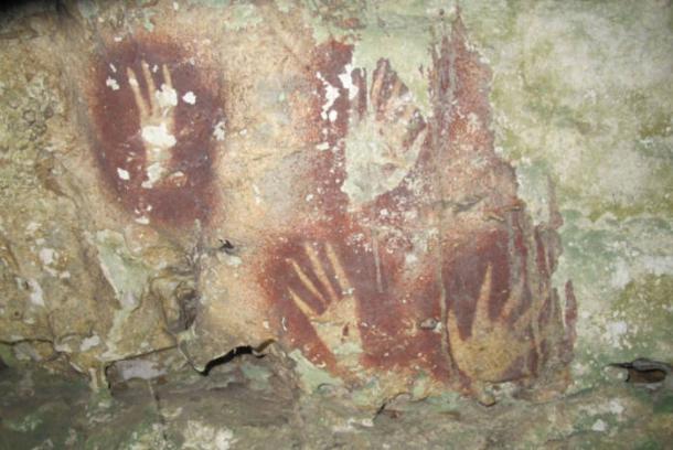 Hand print art in red found in a Sulawesi cave.