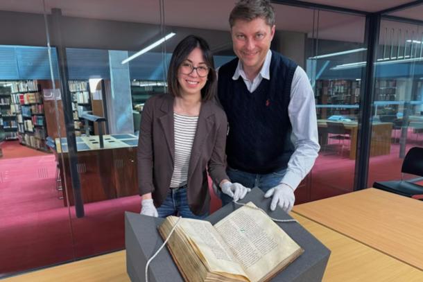 : Dr Elisabetta Magnanti and Dr Mark Faulkner with the Trinity copy of Bede&rsquo;s Ecclesiastical History