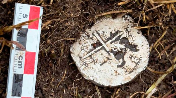 The silver Port Famine coin.