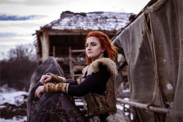 Viking woman enjoying daily pastoral life on the homestead.             Source: selenit / Adobe Stock