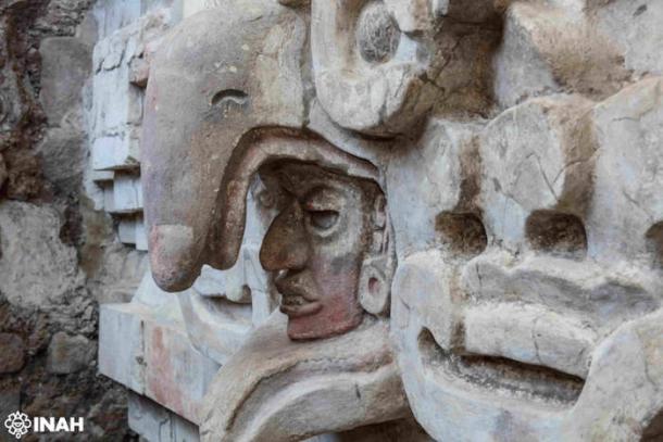 Close up of owl beak over a face above the entrance to the Zapotec tomb found in Mexico