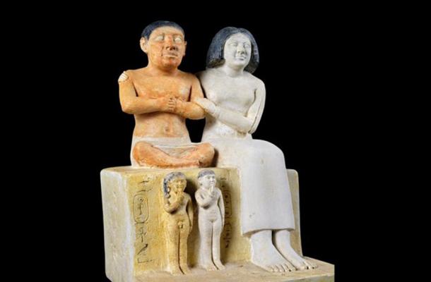 There is much evidence of dwarfs in Egypt. Here, a group statue of the dwarf Seneb and his family at the Egyptian Museum in Cairo. The statue was found in a naos in his mastaba tomb in Giza. Seneb is represented seated, with his legs crossed, beside his wife who embraces him affectionately. His wife is of regular height. 	Source: Ministry of Tourism and Antiquities