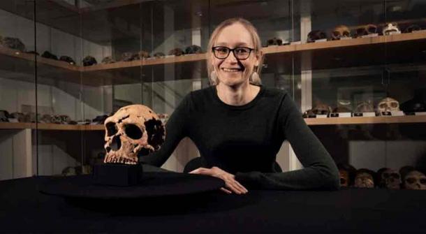 Dr Emma Pomeroy (University of Cambridge) with the skull of Shanidar Z in the Henry Wellcome Building in Cambridge, home of the University’s Leverhulme Centre for Human Evolutionary Studies. Source: BBC Studios/Jamie Simonds/University of Cambridge
