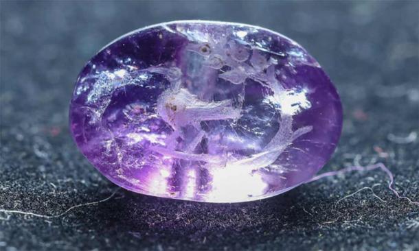 The amethyst seal found in a Jerusalem sewer may be the first artifact ever to depict the Biblical persimmon plant. Source: Eliyahu Yanai / City of David