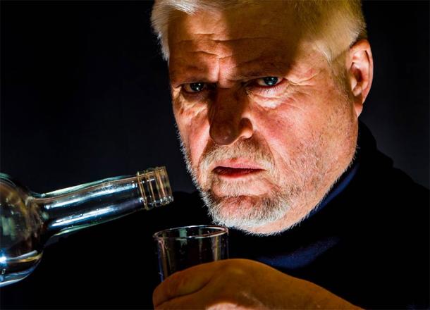 Man drinking alcohol. Credit: Rainer Fuhrmann / Adobe Stock