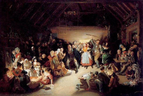 Painting of a crowded nineteenth century Irish Halloween party in a barn, with young people bobbing for apples and dancing while older guests watch