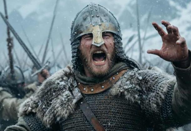 A fierce Viking warrior shouts a war cry mid-battle on a chaotic, snowy field.