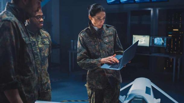 It’s amazing how much can be faked today, given the incredible advances in computer generated images and action scenes. This scene could picture real military personnel or film actors. How can we tell something is a hoax? We can’t really or not easily. That’s the problem! (Gorodenkoff / Adobe Stock)