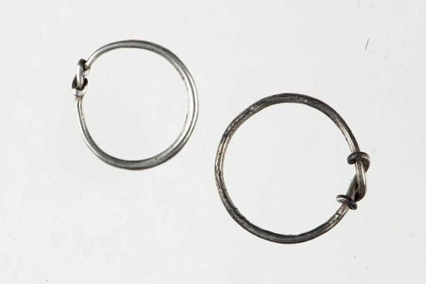 The two whole finger rings from the hoard. Rings like this are often part of treasure finds, but not commonly found in Viking Age graves. This suggests that they were rather used as means of payment, rather than as jewellery. (Birgit Maixner / Gemini.no)