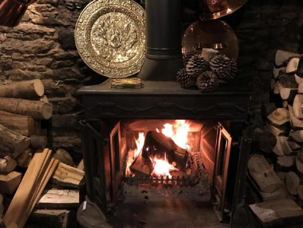 The fireplace in the British pub dates back to the 8th century. (The Old Church House Inn / Facebook)