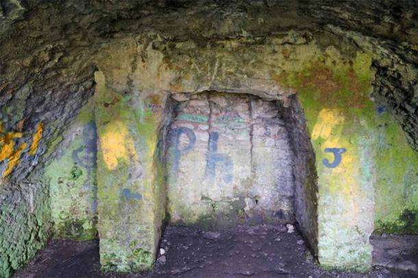 This fireplace used a stone from the ancient burial cairn. (© William Alexander)