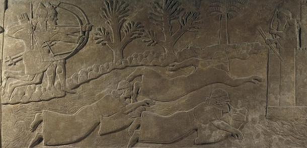“The escape of enemies across a river” depicts men using floatation devices to cross a river in the 9th century BC (or men diving underwater and using air-filled bladders as breathing gear).