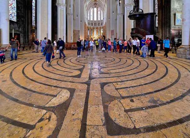The labyrinth on the floor of the center of the nave at Chartres Cathedral, known also as the Cathédrale Notre-Dame de Chartres, in Chartres, France. (Patrick / CC BY-SA 2.0)