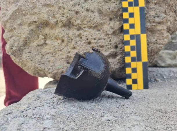 The funnel-shaped object of unknown purpose discovered in the well. 