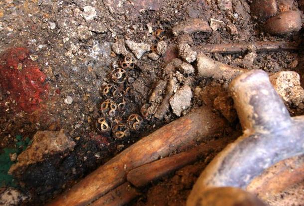 The gold necklace and some of the minerals placed in the Tomb of the Serpent-Jaguar Priests, Pacopampa, Peru 