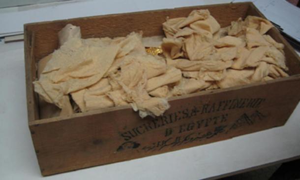 The gold sheets that were in a sarcophagus in the tomb