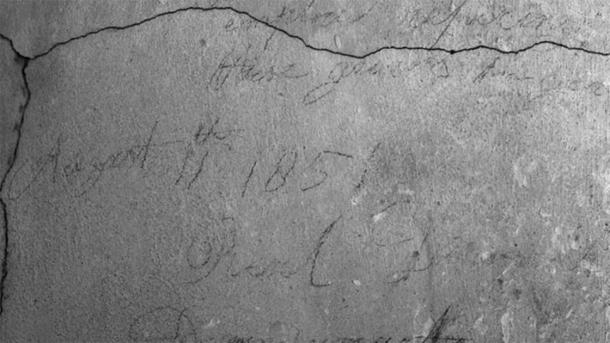 Pencil graffiti found in the secret passage is still visible. (Jessica Taylor / UK Parliament)