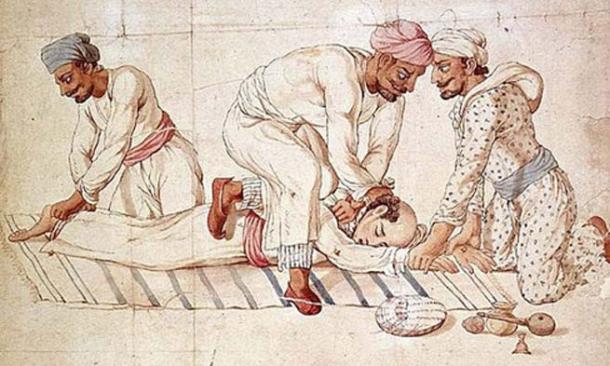 A group of Thugs strangling a traveler on a highway in India in the early 19th century.