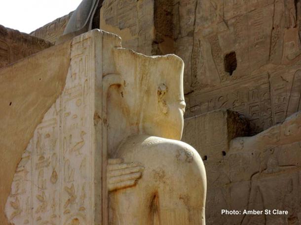 The hand of Ankhesenamun rests protectively upon the back of her husband and half-brother Pharaoh Tutankhamun in this statue at Luxor Temple. The next ruler, elderly King Aye, probably married the young queen to legitimize his claim to the throne.