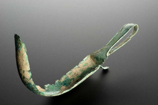 A heavily corroded Roman bronze Strigil housed in the Science Museum in London, once used to scrape off sweaty body grime. (Wellcome Collection / CC BY 4.0)