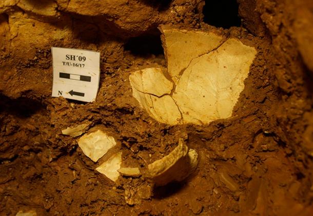 The hominin's bones were found in LH6—in a layer of red clay fairly deep