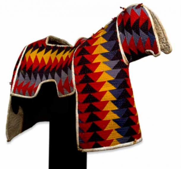 A unique quilted horse armor (with diamond patchwork design; comprising four pieces sewn together) made of cotton, fiber padding, wood toggles, and rope/yarn ties, used by the Mahdia. The term refers to the period between 1881 and 1898 of the Sudanese nationalist movement led by Mohamed Ahmed al-Mahdi (the Mahdi) against the Turkiya which led to the capture of Khartoum in 1885. (© The Trustees of the British Museum/CC-BY-NC-SA 4.0)
