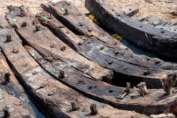 The hull of the 16th-century ship remains at the quarry. (Wessex Archaeology)