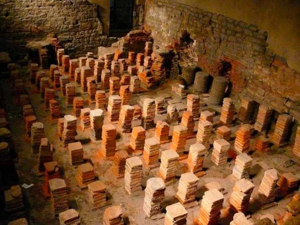 A hypocaust (Latin hypocaustum) in the Roman Baths, Bath, UK. A hypocaust is an ancient Roman system of central heating. The word literally means 