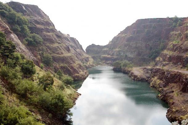 Ngwenya mine is the oldest known mine in the world. The San, or Bushmen, mined hematite here 40,000 years ago to make paint for cave paintings and probably other uses. It was mined commercially up until the 1970s. ( Heather Dowd/CC BY-SA 2.0)