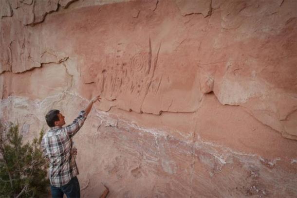 Polish archaeologist analyzing some of the Pueblo people’s rock art found at the Mesa Verde site in Colorado. (Jagiellonian University)