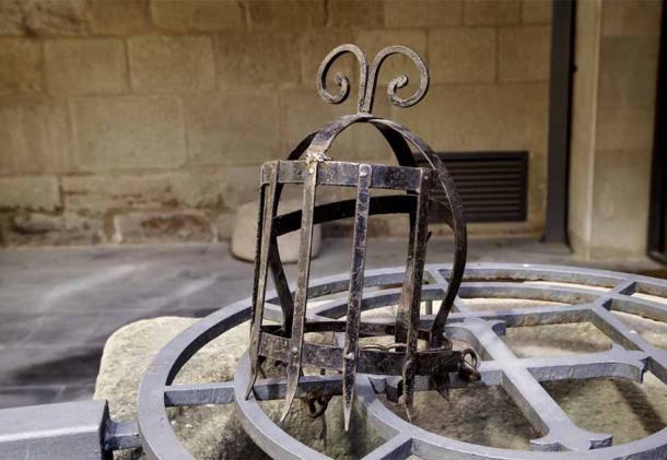 An iron mask from a Medieval torture museum. (celiafoto / Adobe Stock)