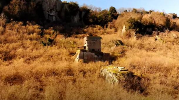 Etruscan Sasso del Predicatore rock cube in the Selva di Malano, Italy. (Project Tuscia / Youtube screenshot)