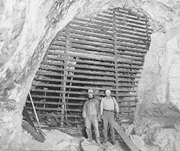Dave Derosiers and Stan Sloan of the National Park Service show off the completed Stanton’s Cave gate: 20 feet high and 20 feet across. (Bat Conservation International)