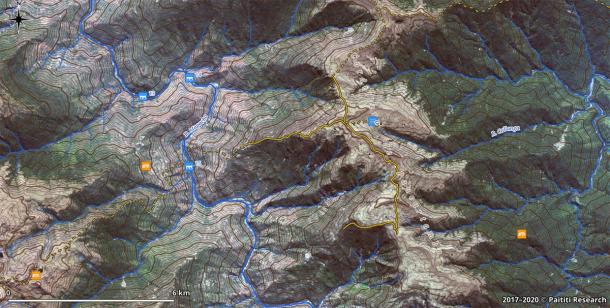 A GIS screenshot showing a fragment of the map with discovered Inca trails (continuous orange lines) and reconstructed paths (dashed lines), overlaid on a high-resolution satellite image. (Paititi Research Team)