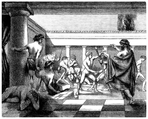 Young men training in Sparta for the wrestling event of the Olympic Games. (Erica Guilane-Nachez / Adobe Stock)