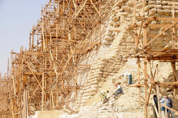 Modern wooden scaffolding set up around Djoser’s Step Pyramid at Saqqara (David Broad / CC BY 3.0)