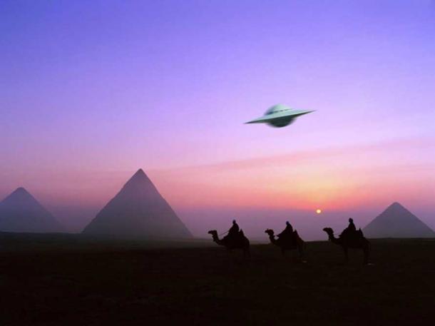 An imaginative depiction of a UFO over camels and pyramids.
