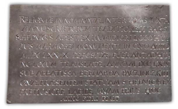 The inscription panel that was laid on top of the casket bore the date 1764, suggesting St. Jadwiga’s bones hadn’t been seen since that time. (trzebnica.pl / Fair Use)