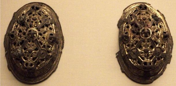 Pair of intricately crafted brooches, such as worn by most Viking women.