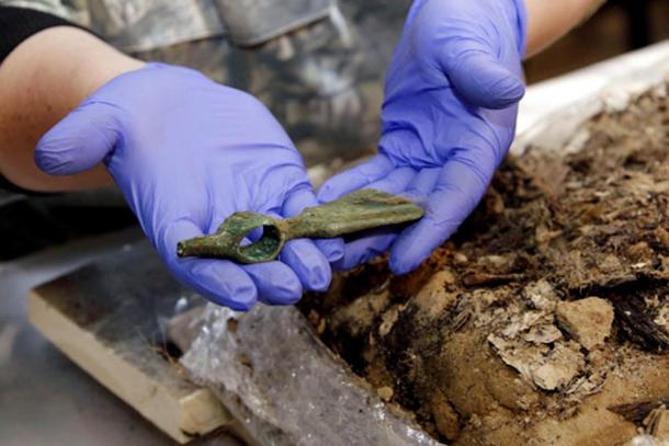 The items found with the body - the axe, pendant and rings - suggests 'this was not some poor boy'.