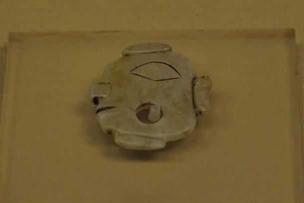 A jade artifact found at Shimao.